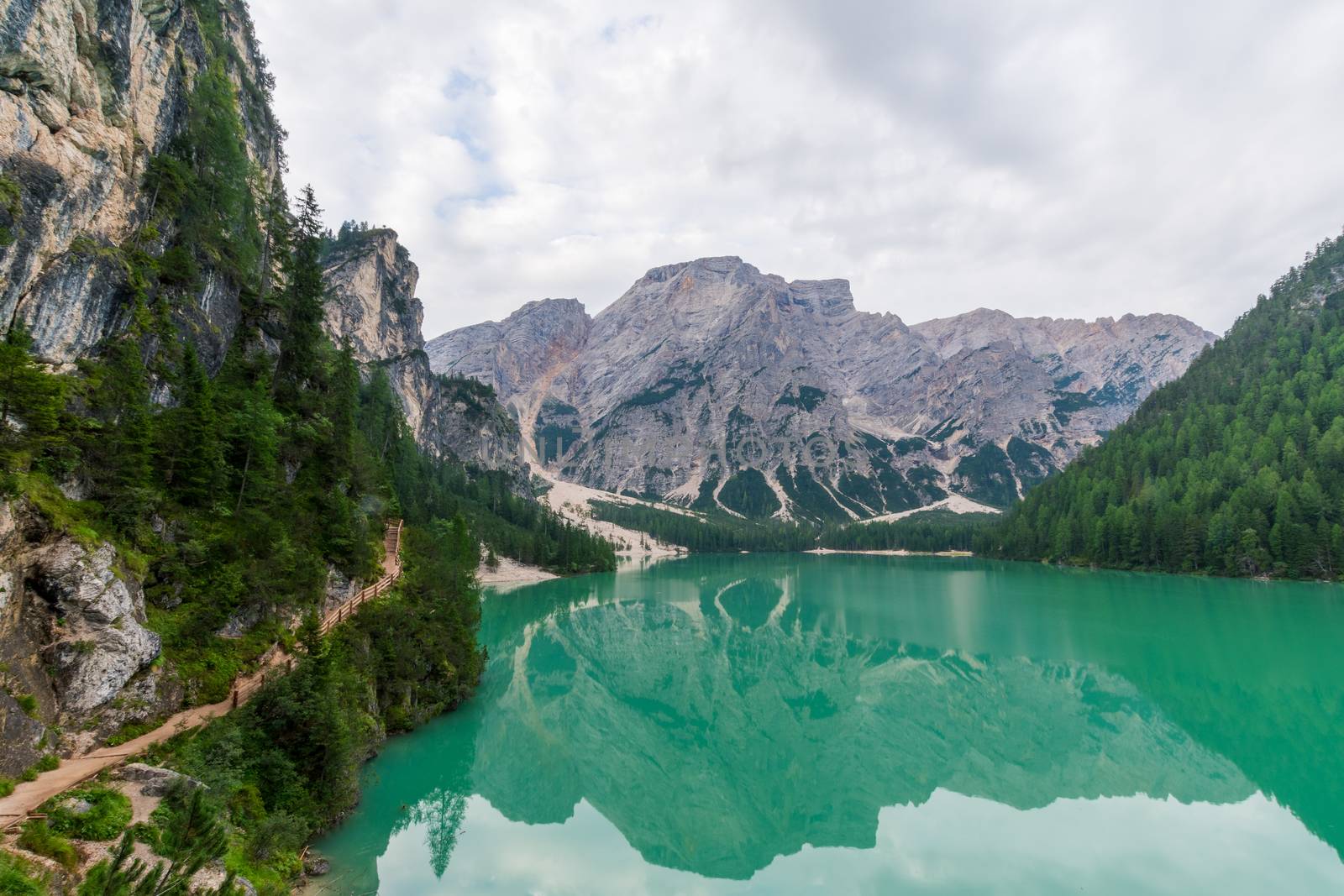 View of Lake Braies and a path that runs alongside it by brambillasimone