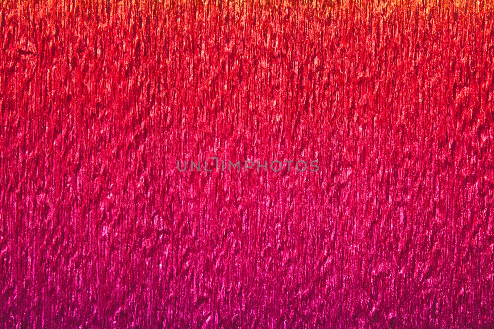 The picture shows a background with red crepe paper