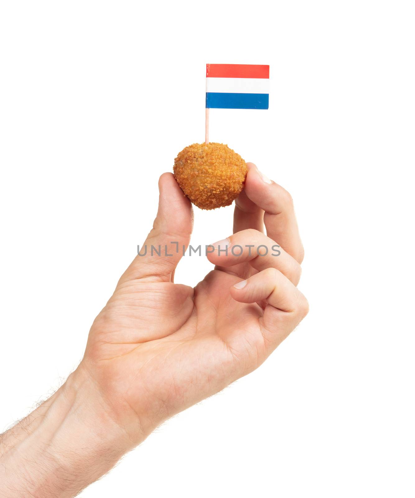 Single dutch traditional snack bitterbal in a hand by michaklootwijk