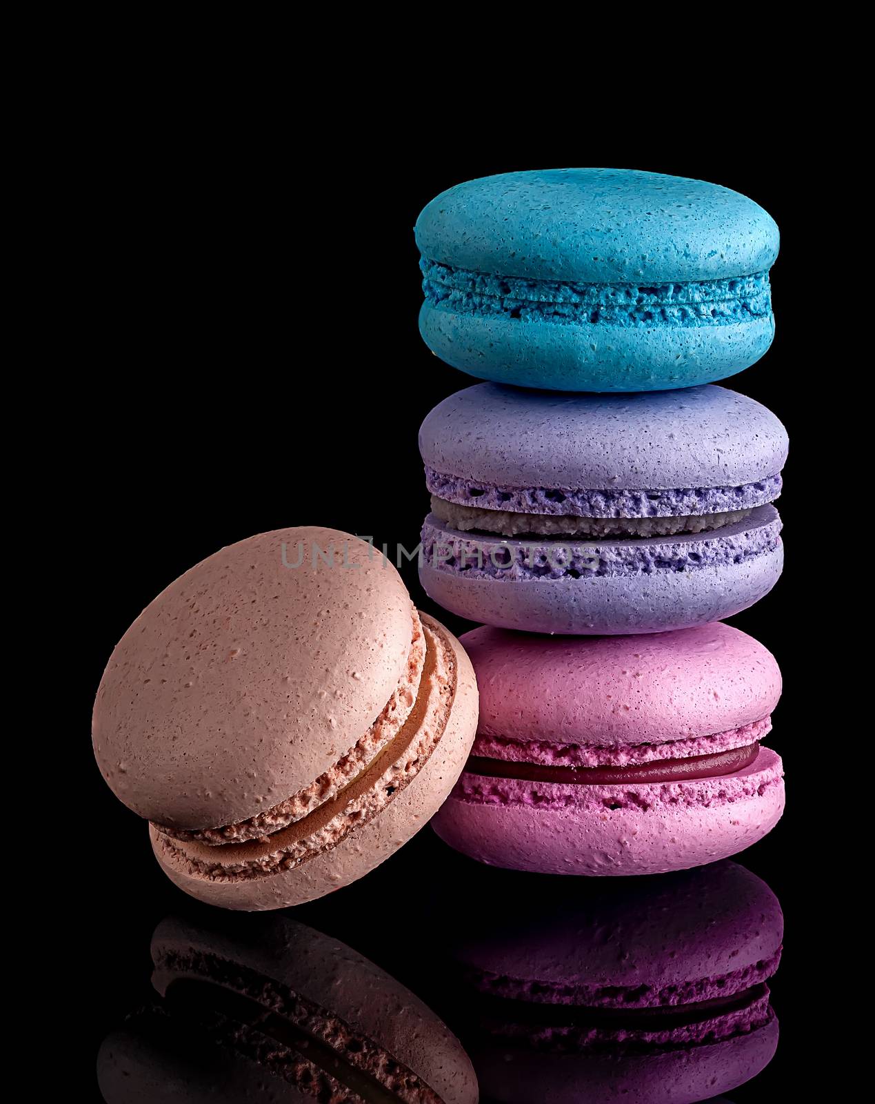 Colorful macaroon each other and one next by Cipariss