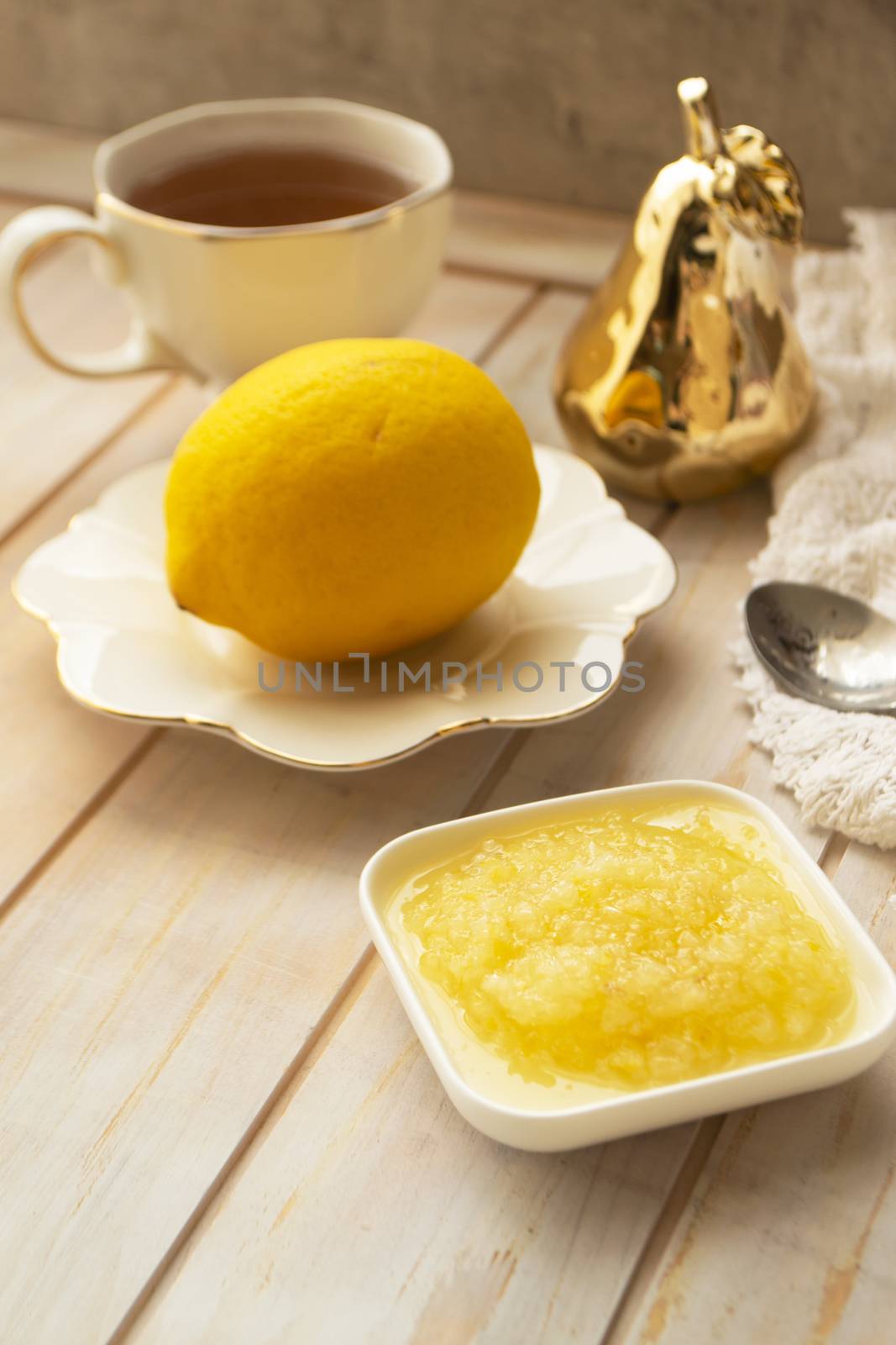 cup of tea with fresh lemon and ground