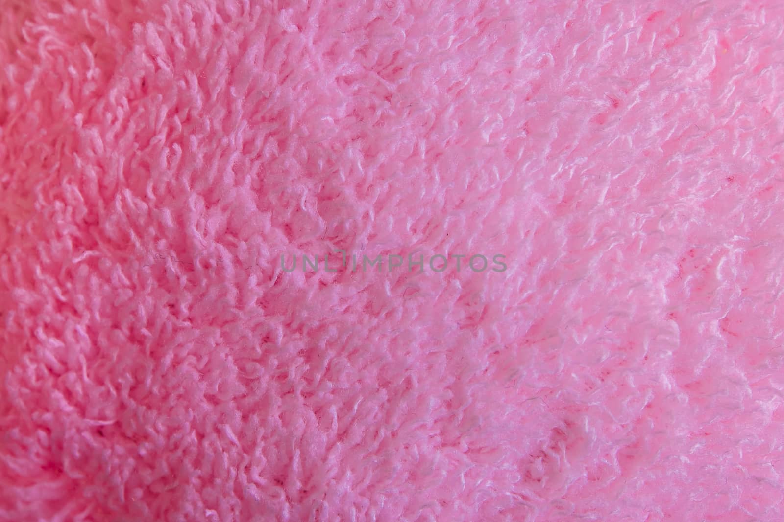 Texture of pink color fur fabric by Satakorn