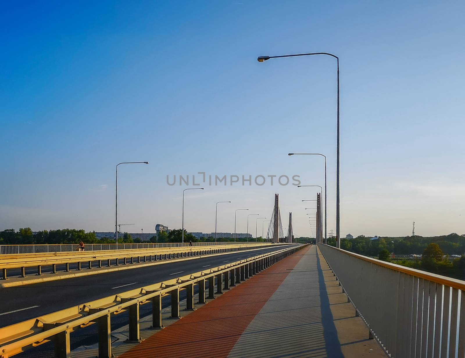 Red and gray pavement on huge Millennium bridge in Wroclaw by Wierzchu