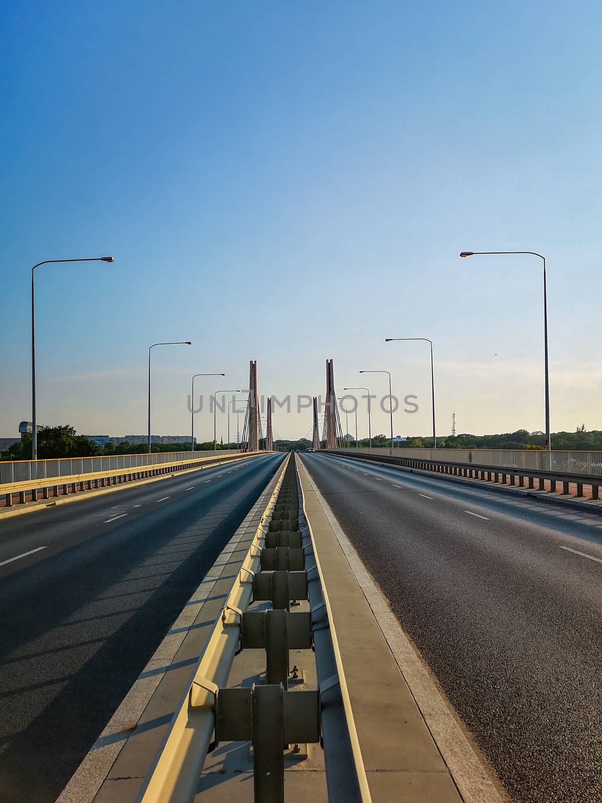 Steel barrier in center of street over Millennium bridge in Wroclaw city by Wierzchu