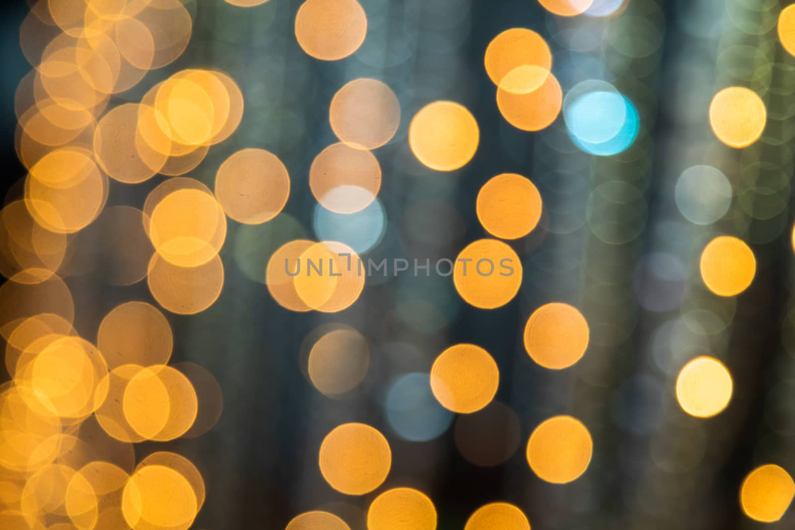 Abstract background of light spots. Light garland side.