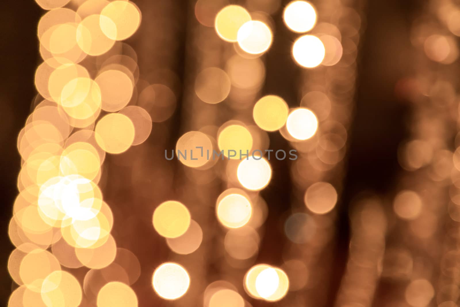 Abstract background of light spots. Light garland side.