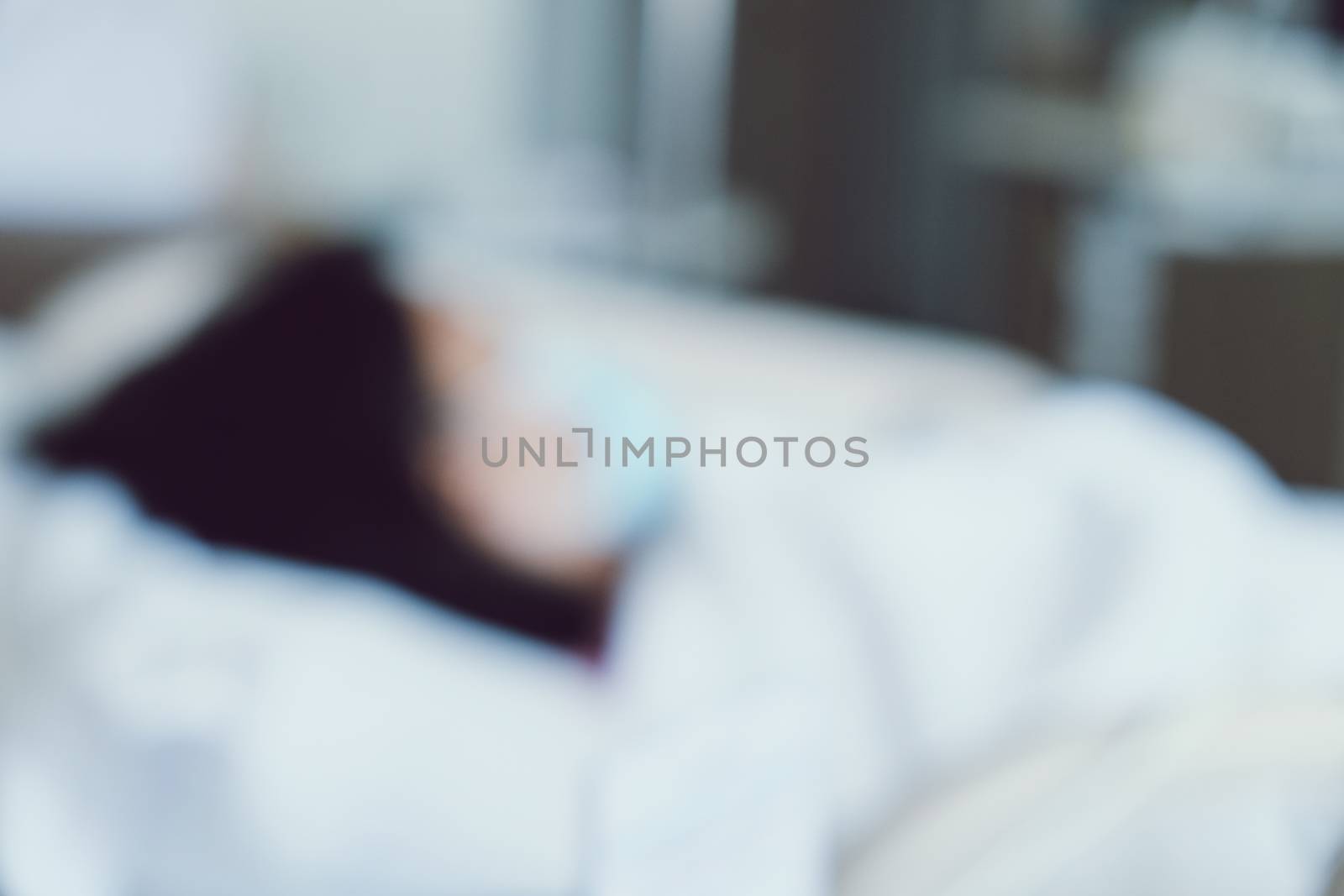 Abstract blur of Elderly patients in hospital bed background