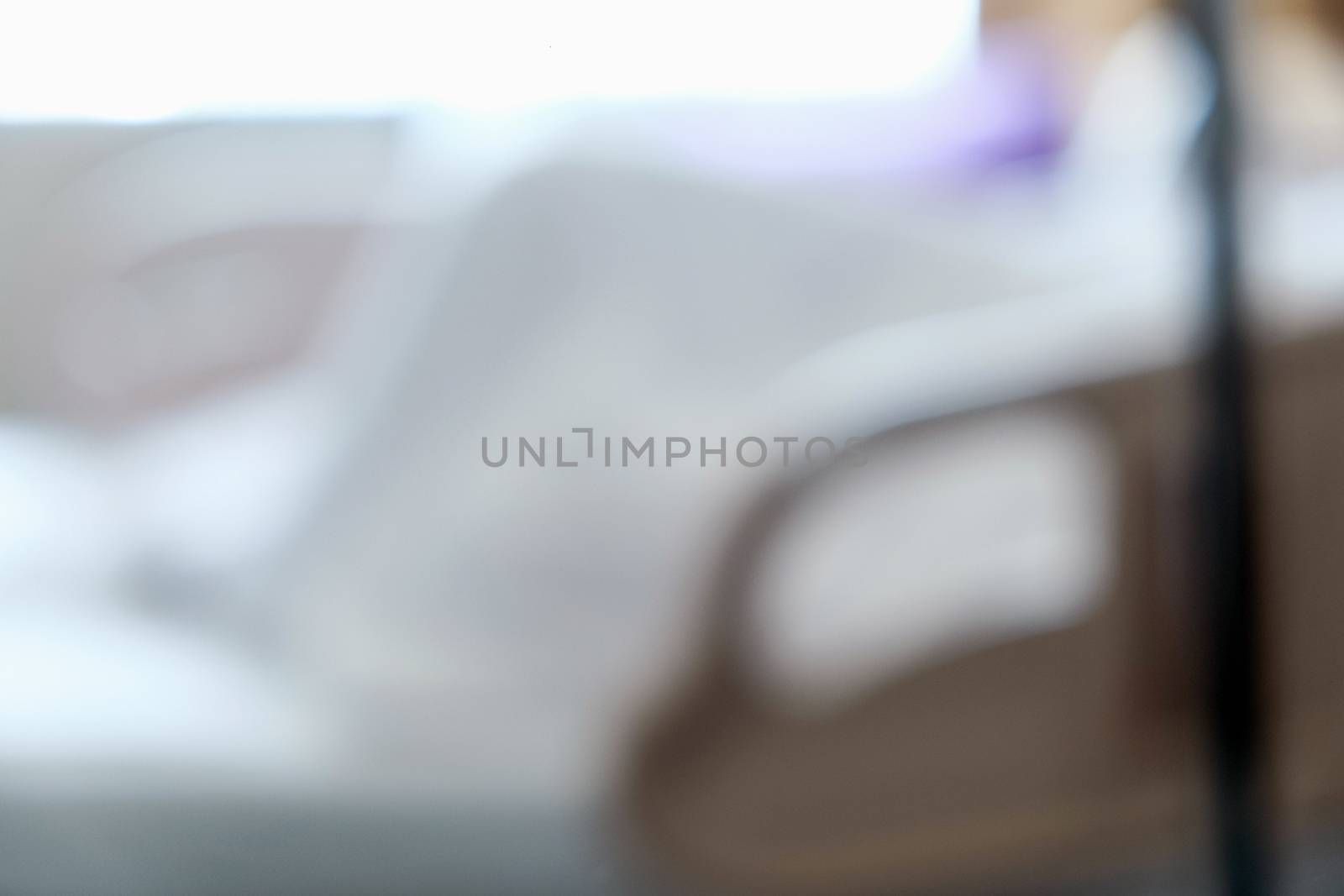 Abstract blur of Elderly patients in hospital bed background