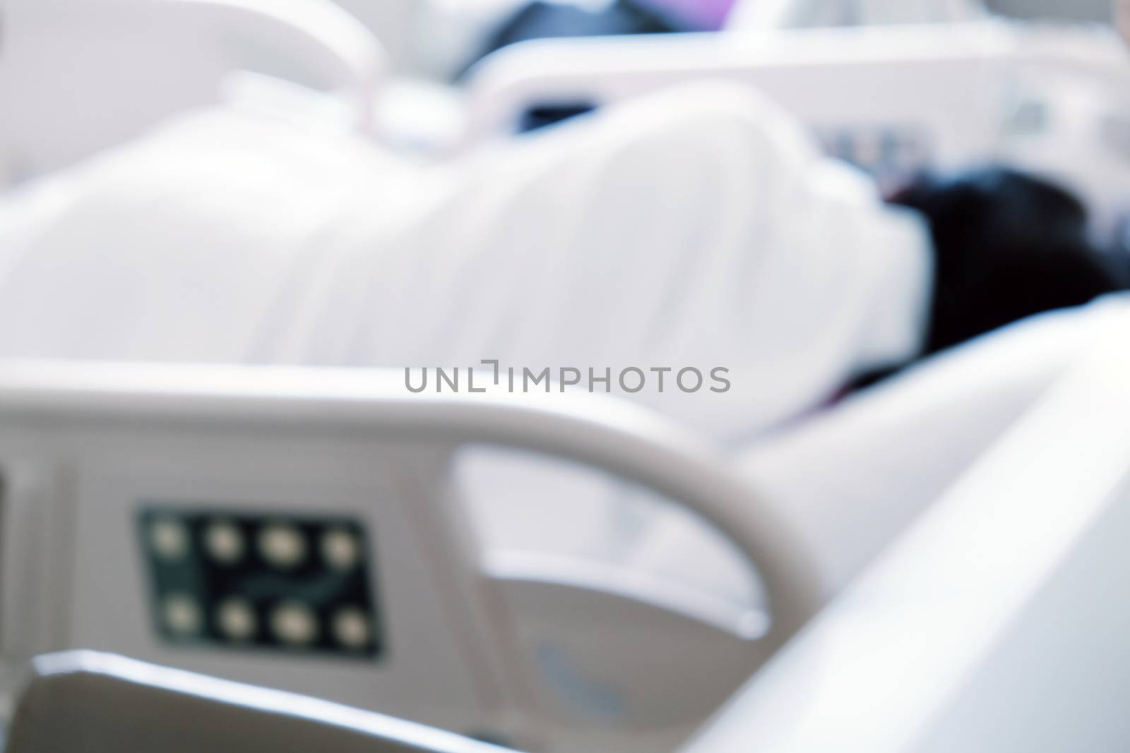 Close up of Patient bed with Elderly patients in hospital