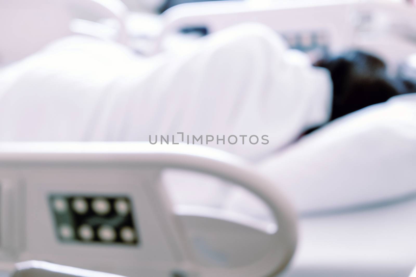 Close up of Patient bed with Elderly patients in hospital