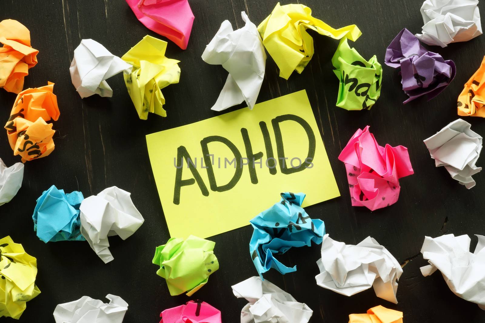 ADHD Attention deficit hyperactivity disorder sign and paper balls.