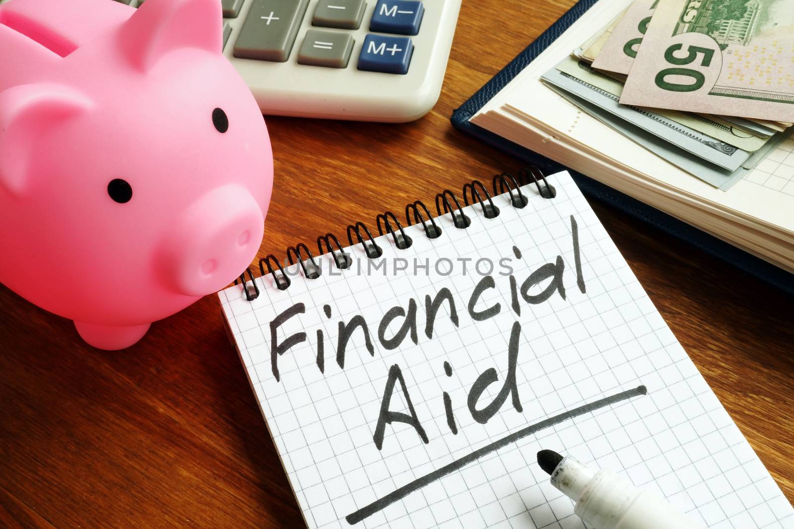 Financial aid sign with money and piggy bank. by designer491