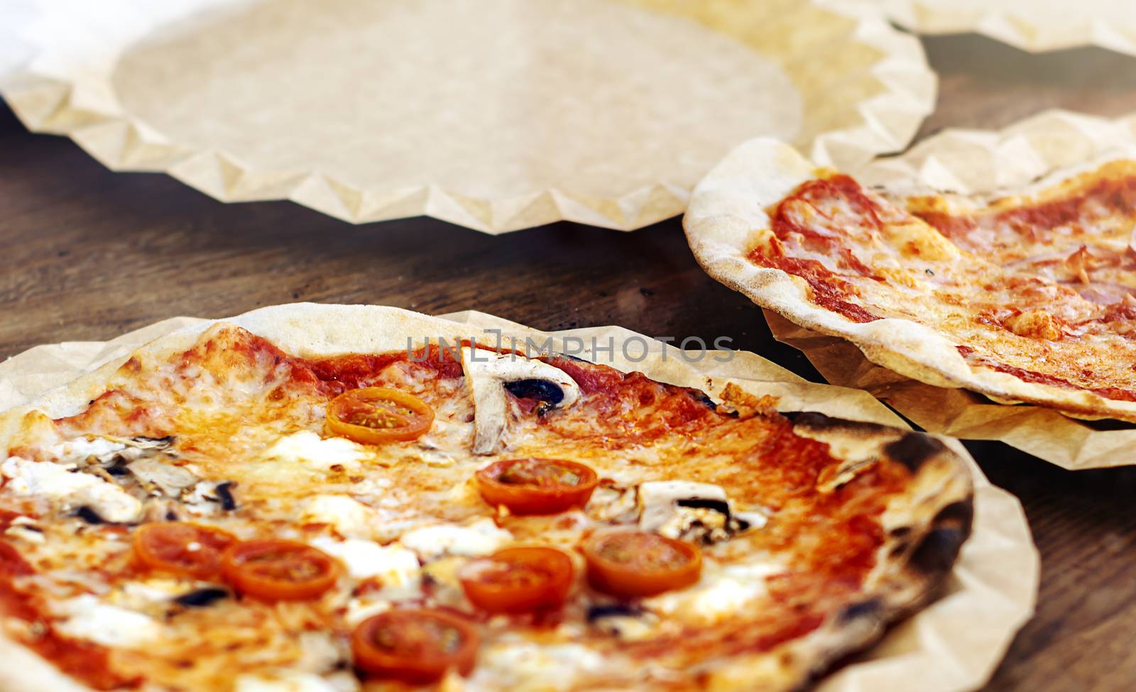 Freshly baked margherita pizza topped with tomato sauce, mozzarella and mushrooms. by rarrarorro