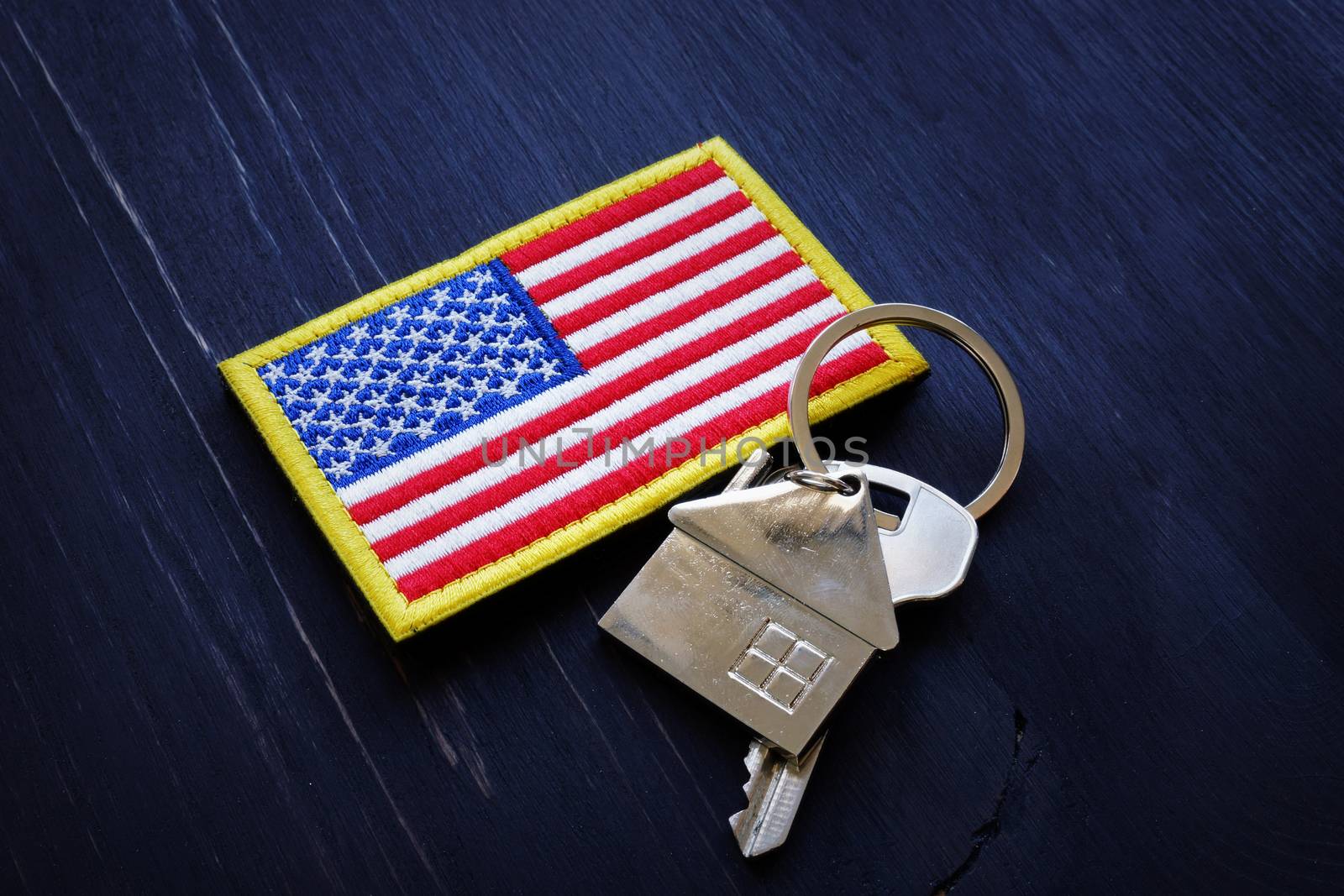 American flag and key from home. VA Streamline Refinance loan concept. by designer491
