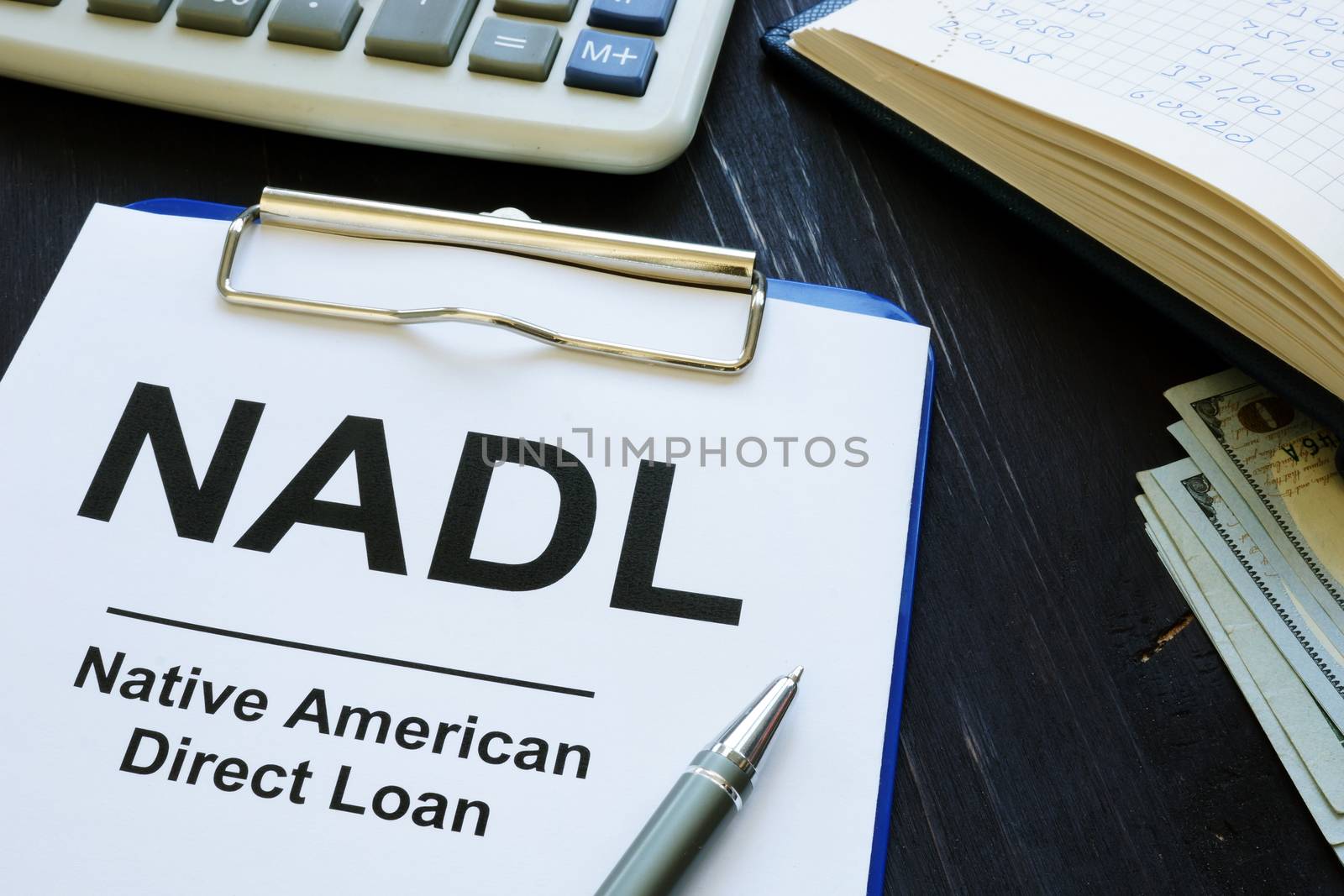 Direct loan NADL papers and clipboard.