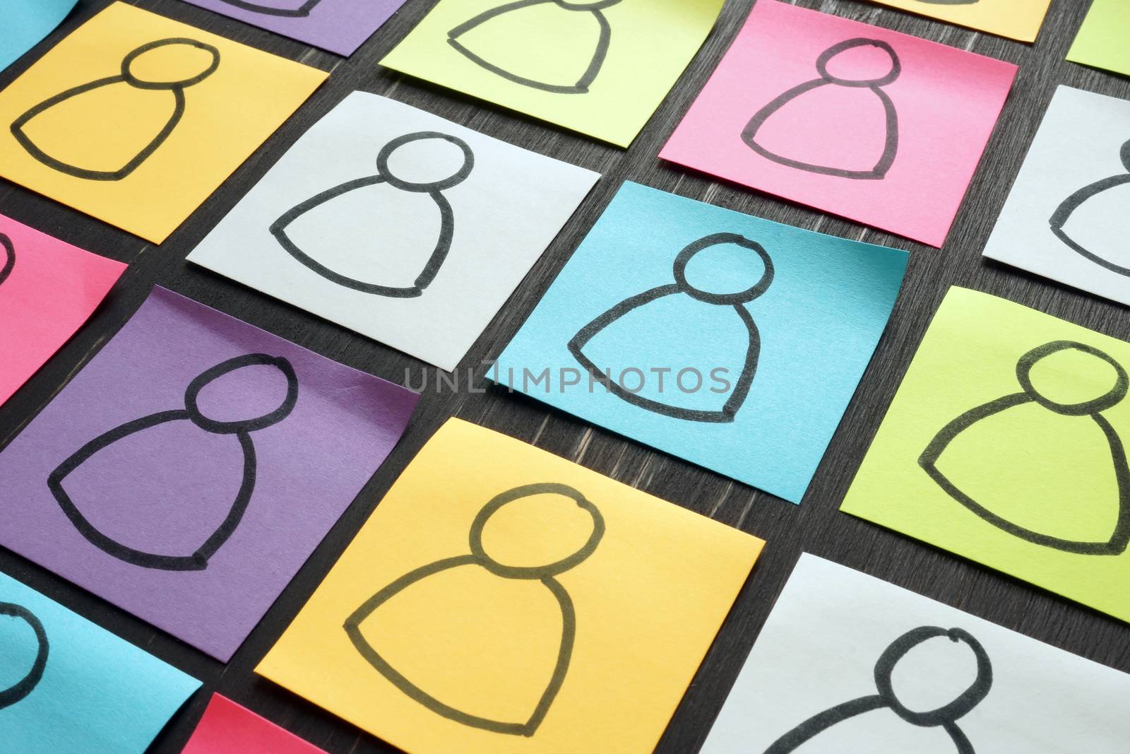 Diversity and inclusion concept. Silhouettes of people on colorful sheets. by designer491