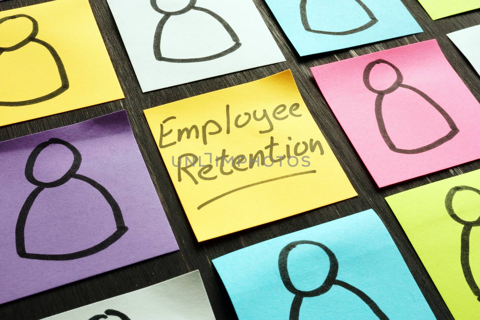 Employee retention sign and figurines on the memo sticks. by designer491