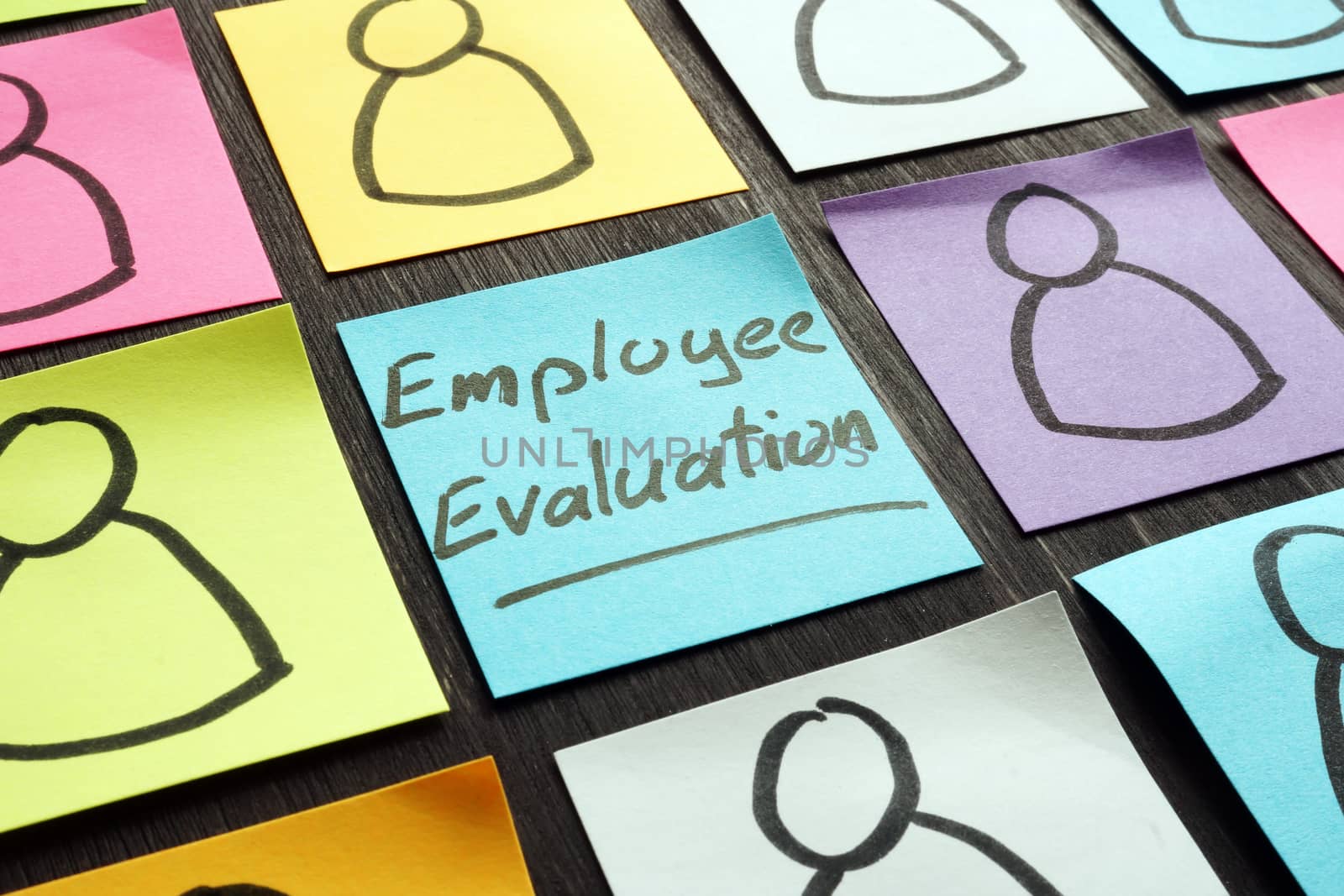 Employee evaluation concept. Colored memo sticks. by designer491