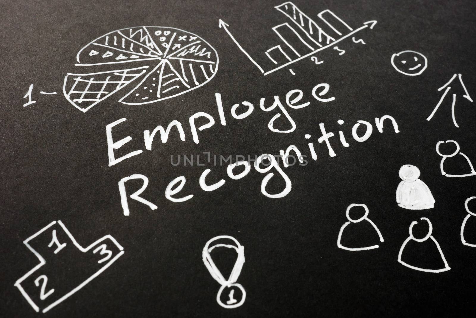 Employee recognition inscription on the black sheet. by designer491