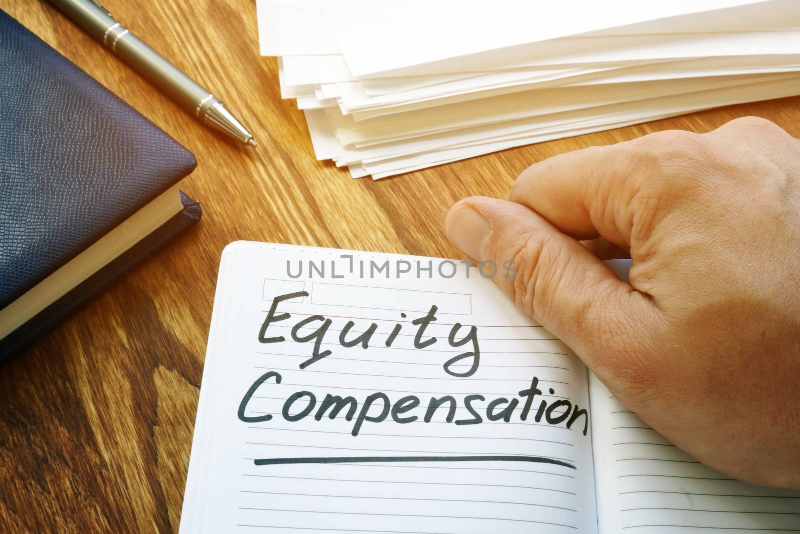 Equity compensation words in the brown notebook.