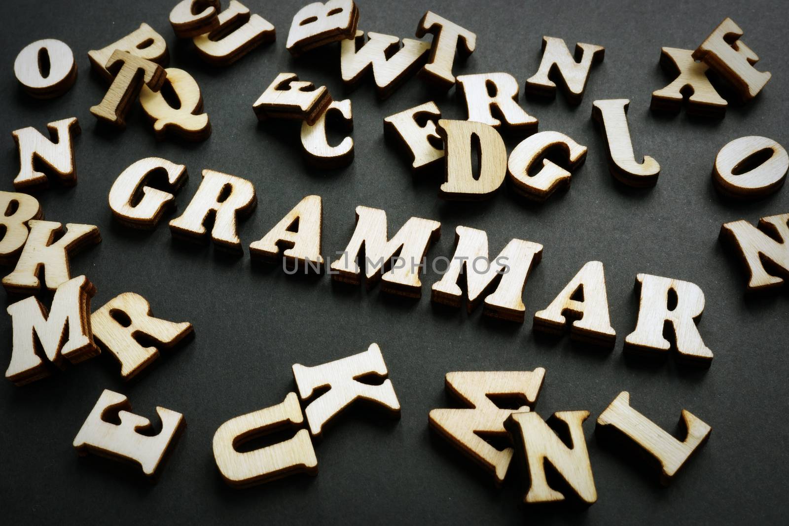 Grammar word from wooden letters. Learn English concept. by designer491