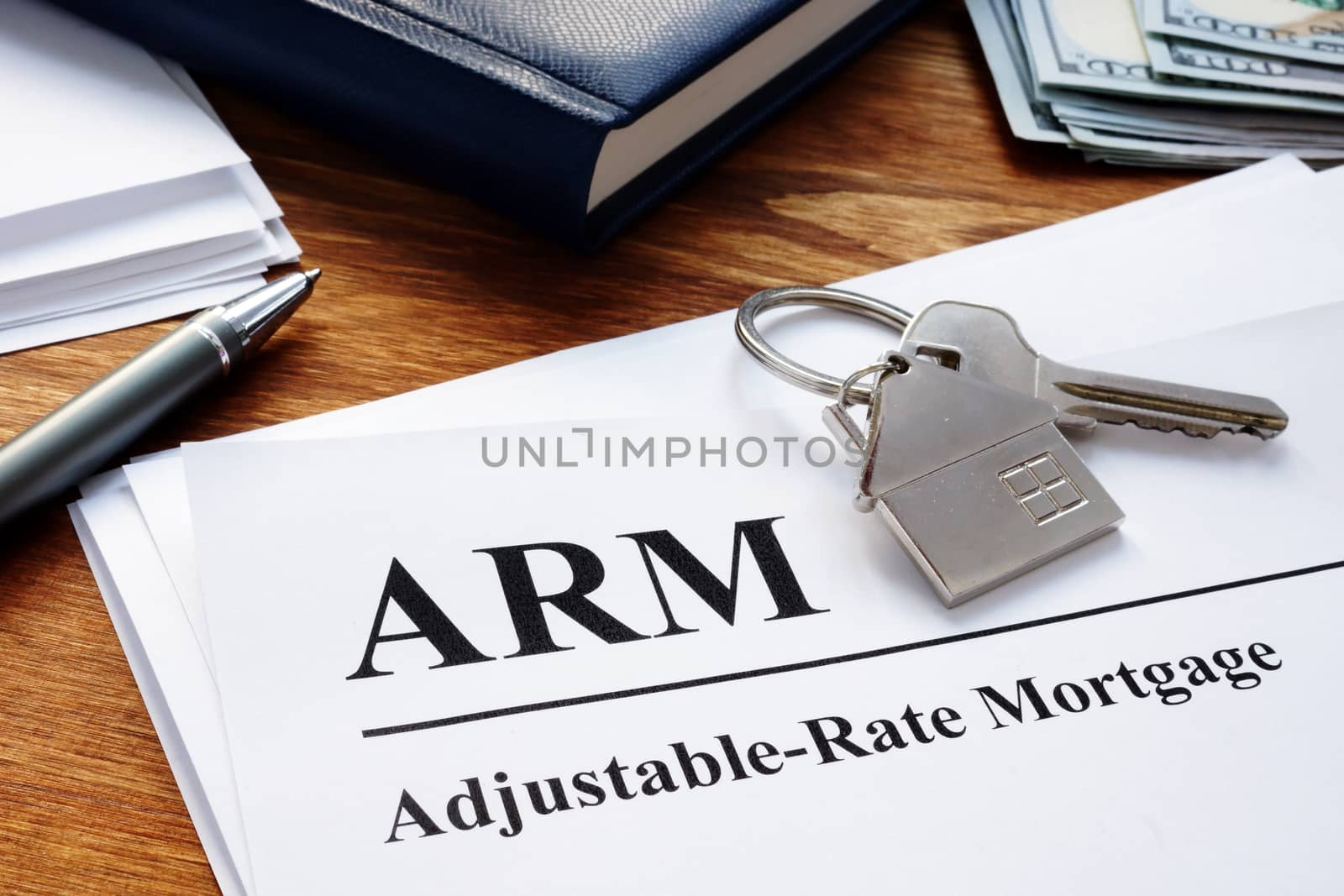 Adjustable Rate Mortgage ARM papers in the office. by designer491