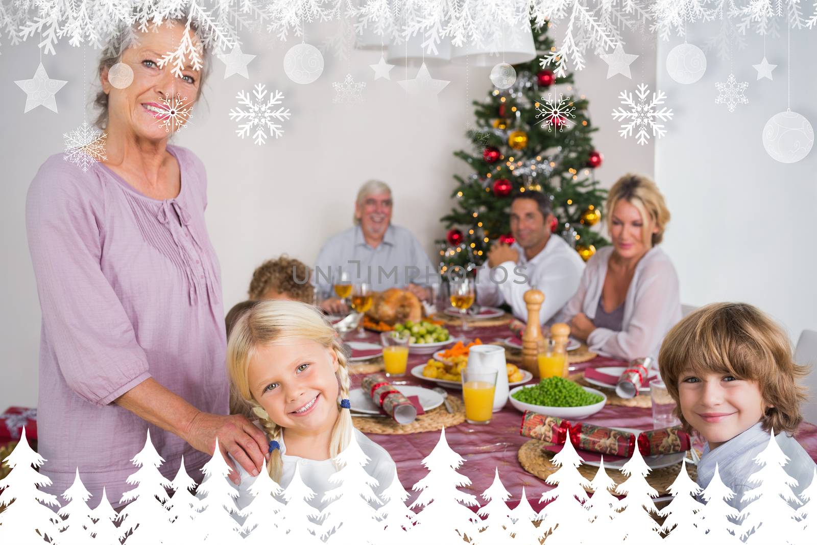 Composite image of grandmother and granddaughter standing beside the dinner table by Wavebreakmedia