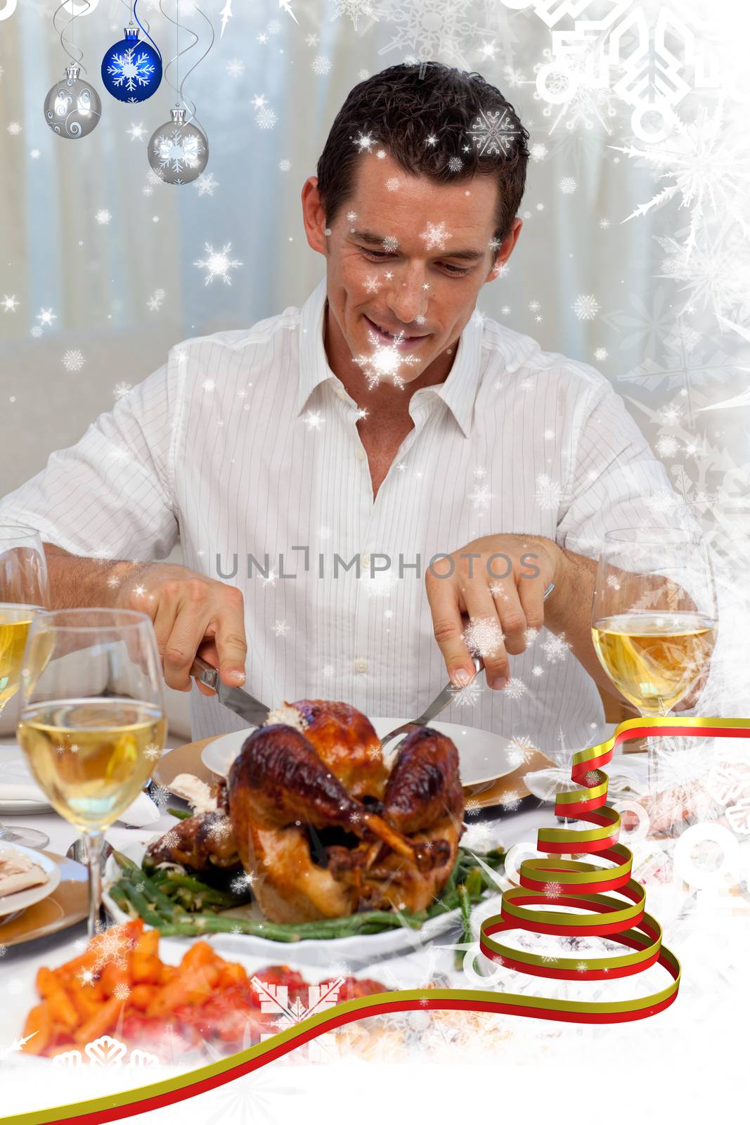 Attractive man eating turkey in christmas dinner by Wavebreakmedia