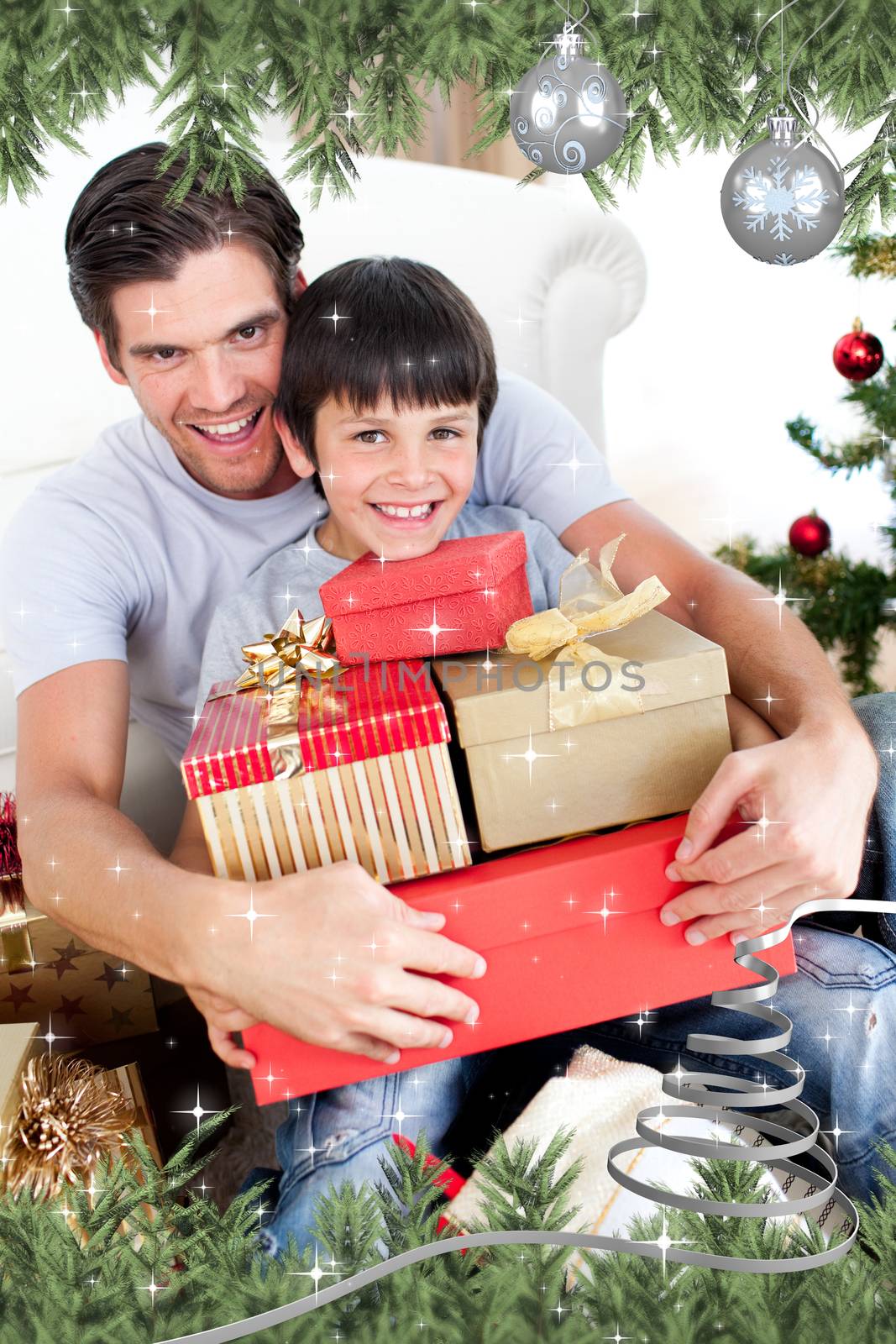 Happy father and son holding Christmas presents against twinkling stars