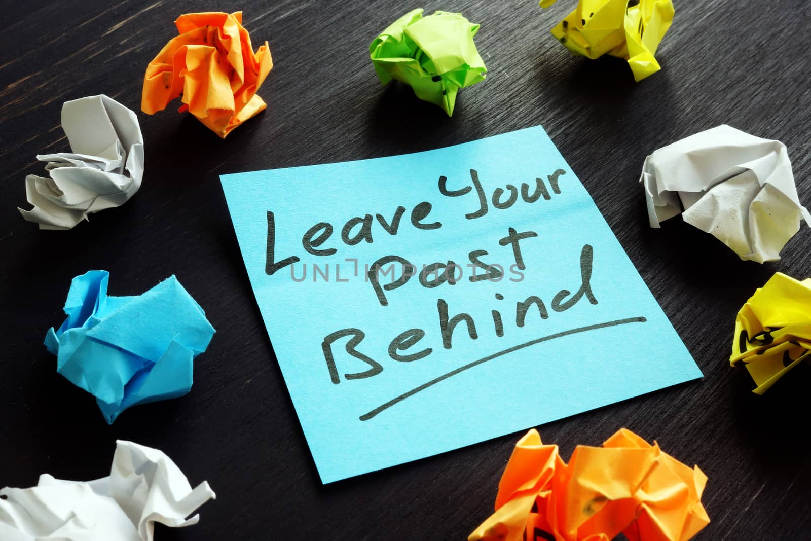 Leave your past behind sign on the memo stick. by designer491