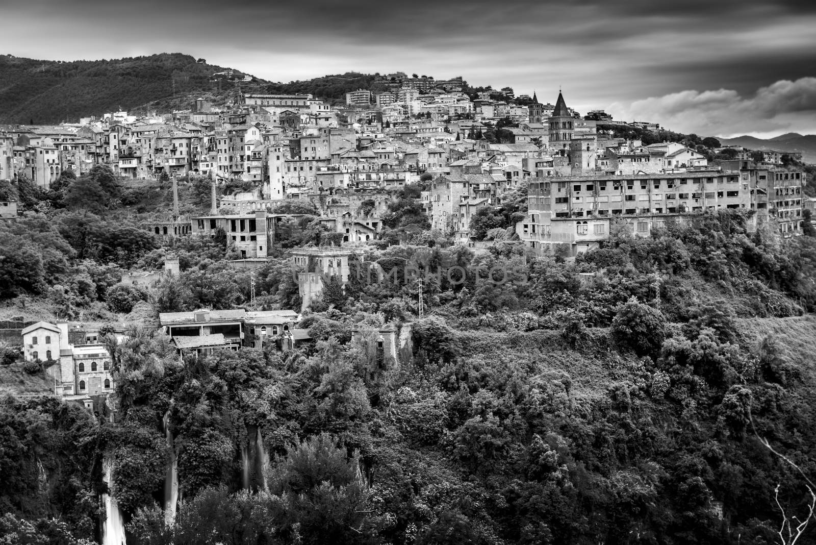 Tivoli is an ancient Italian town in Lazio, about 30 kilometres (19 miles) east-north-east of Rome, at the falls of the Aniene river where it issues from the Sabine hills