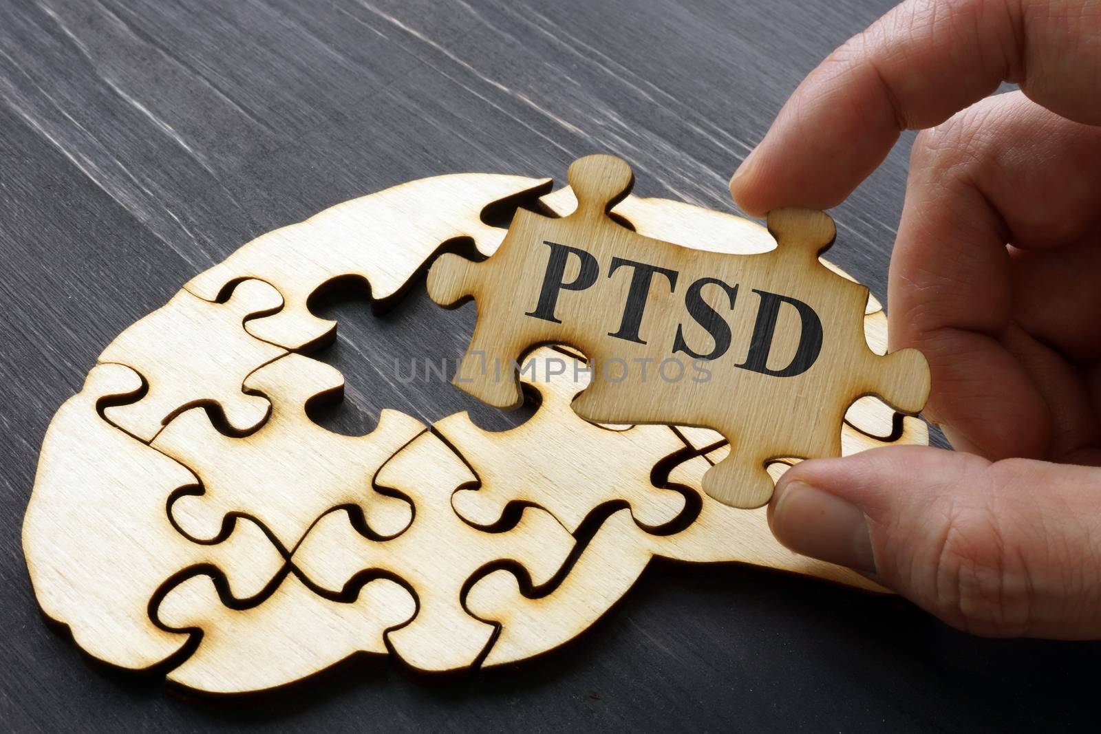 PTSD Post Traumatic Stress written on the puzzle. by designer491