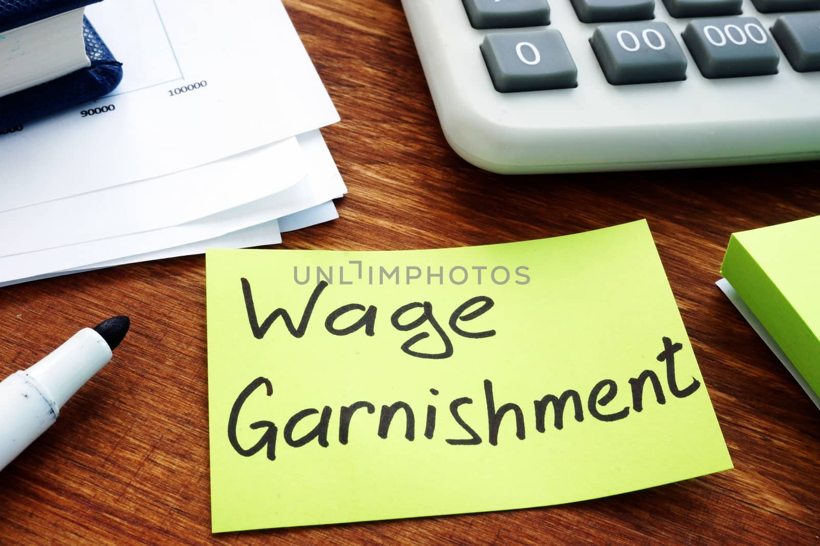 Wage Garnishment written on the yellow sheet. by designer491