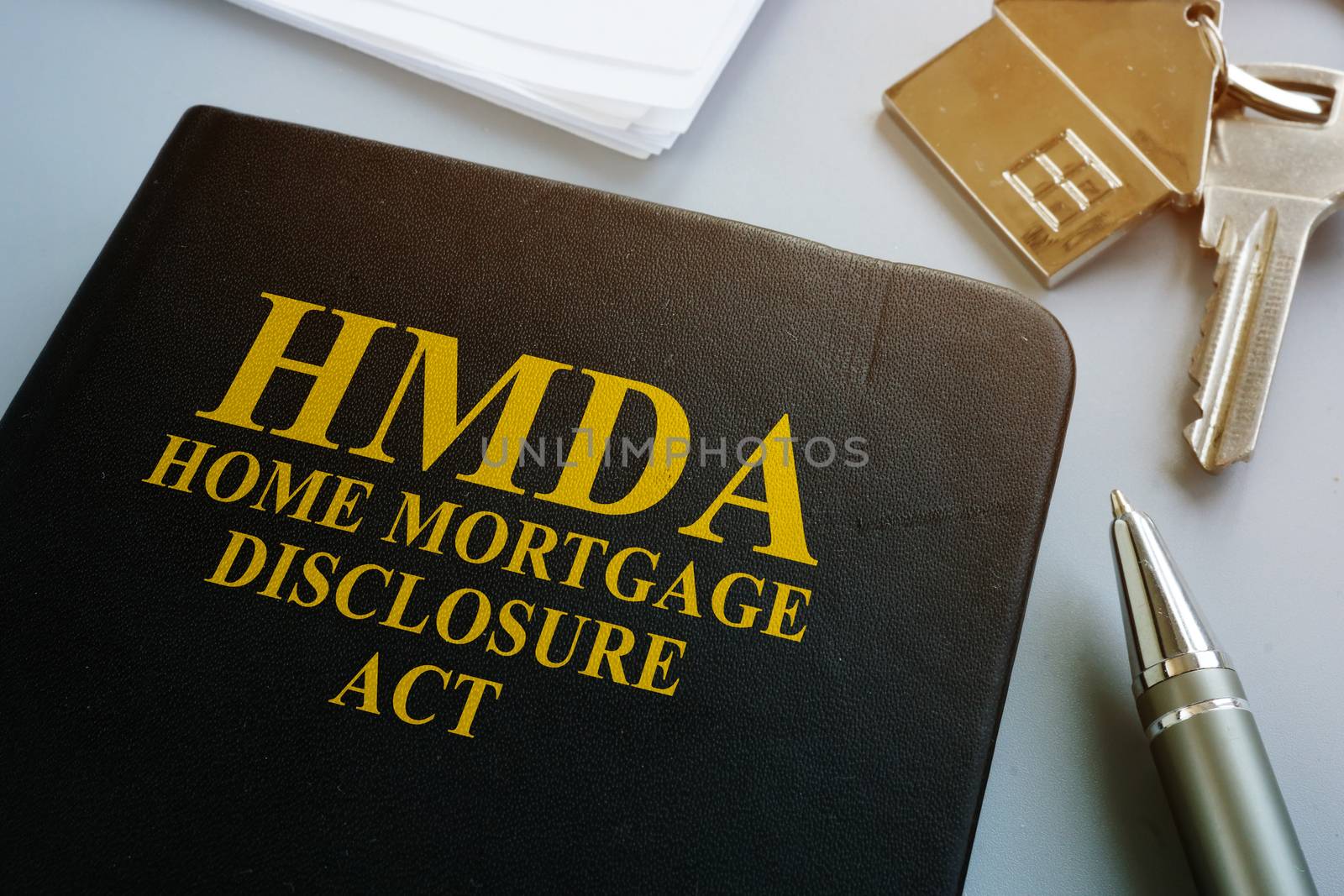 Home Mortgage Disclosure Act HMDA on the desk. by designer491