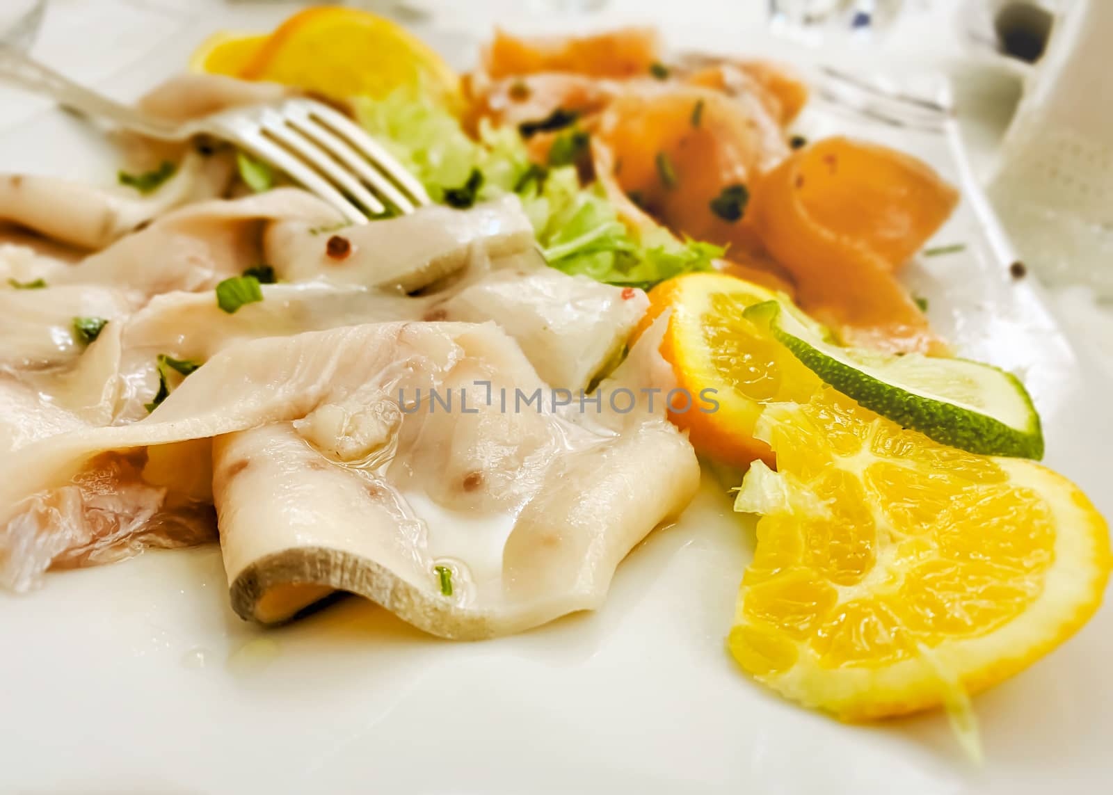 Raw seafood dish served on a restaurant table by rarrarorro