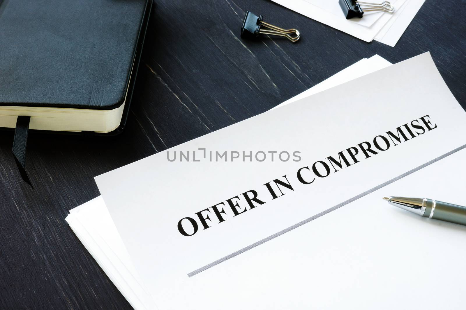 IRS Offer in Compromise OIC agreement and pen.