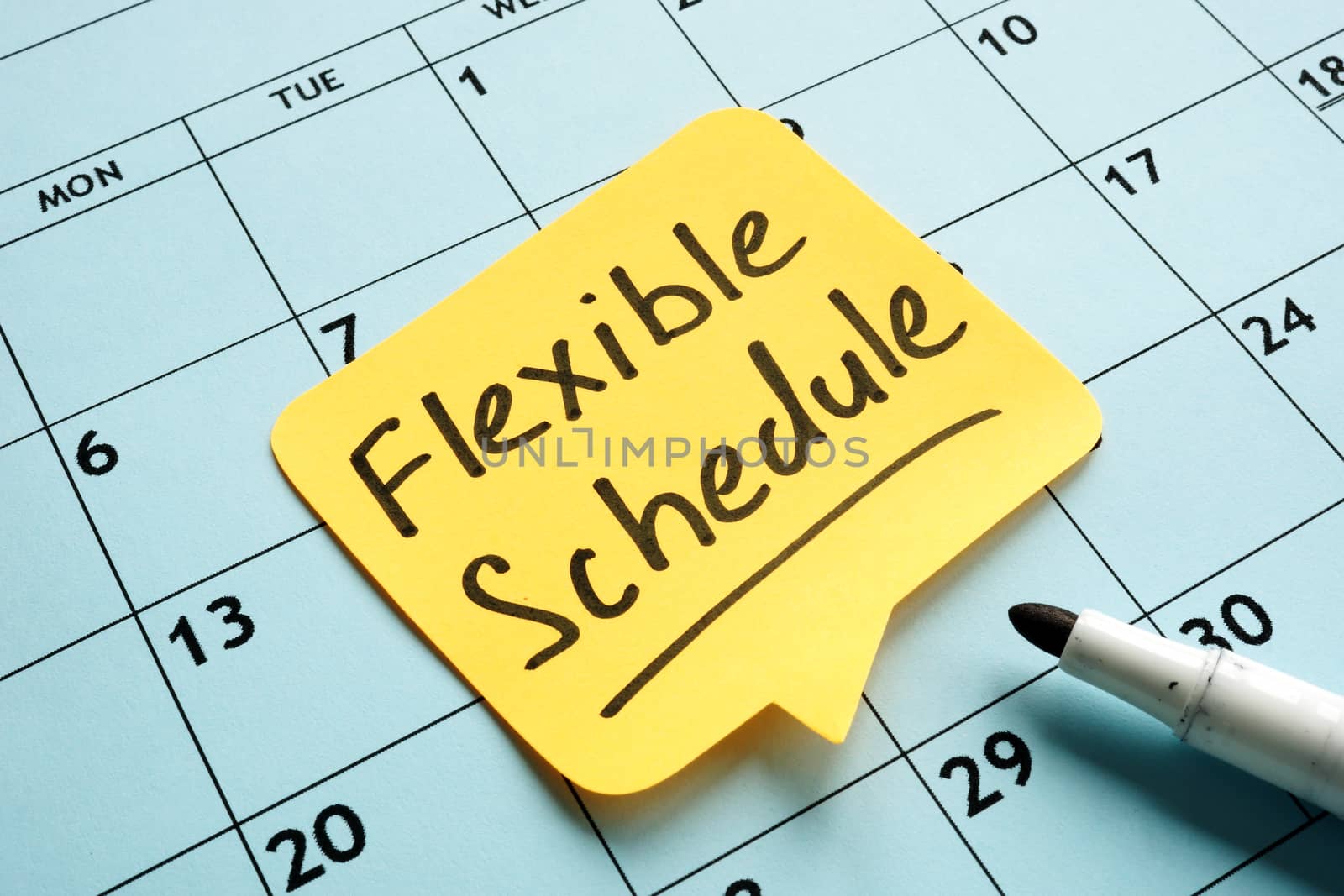 Flexible schedule handwritten memo on the calendar.