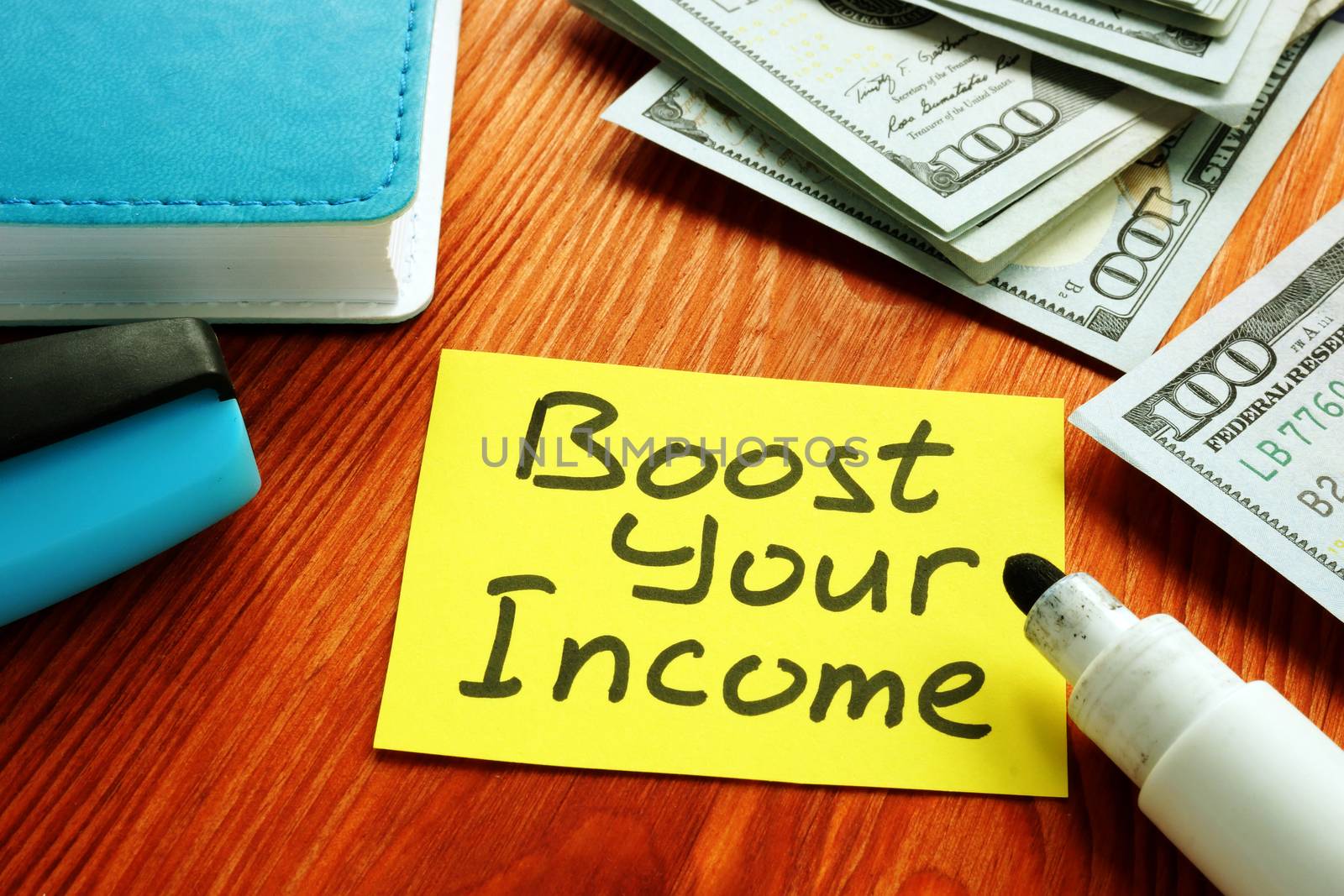 Boost Your Income financial motivation phrase and money.