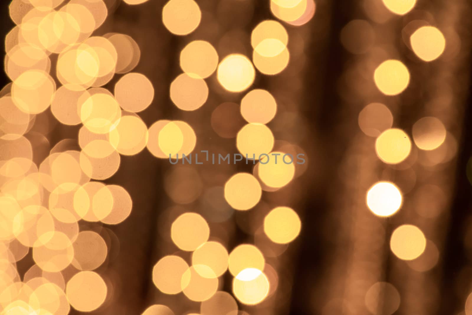 Abstract background of light spots. Light garland side.