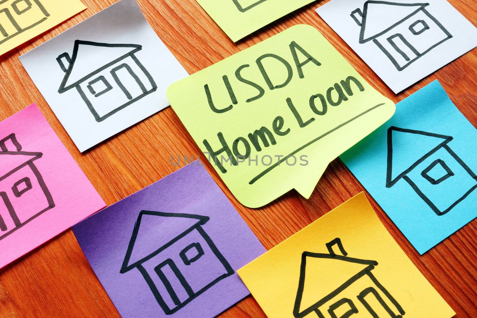 USDA home loan and drawn homes on a paper. by designer491