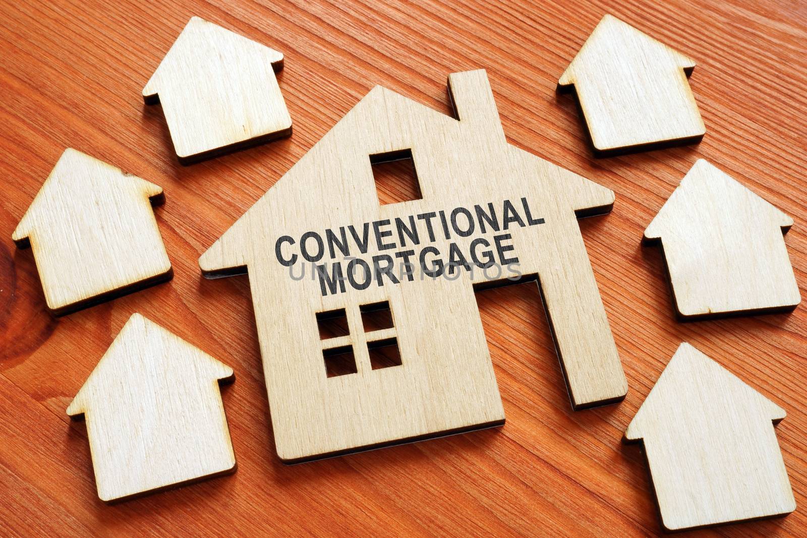 Conventional Mortgage sign on the tiny wooden home. by designer491