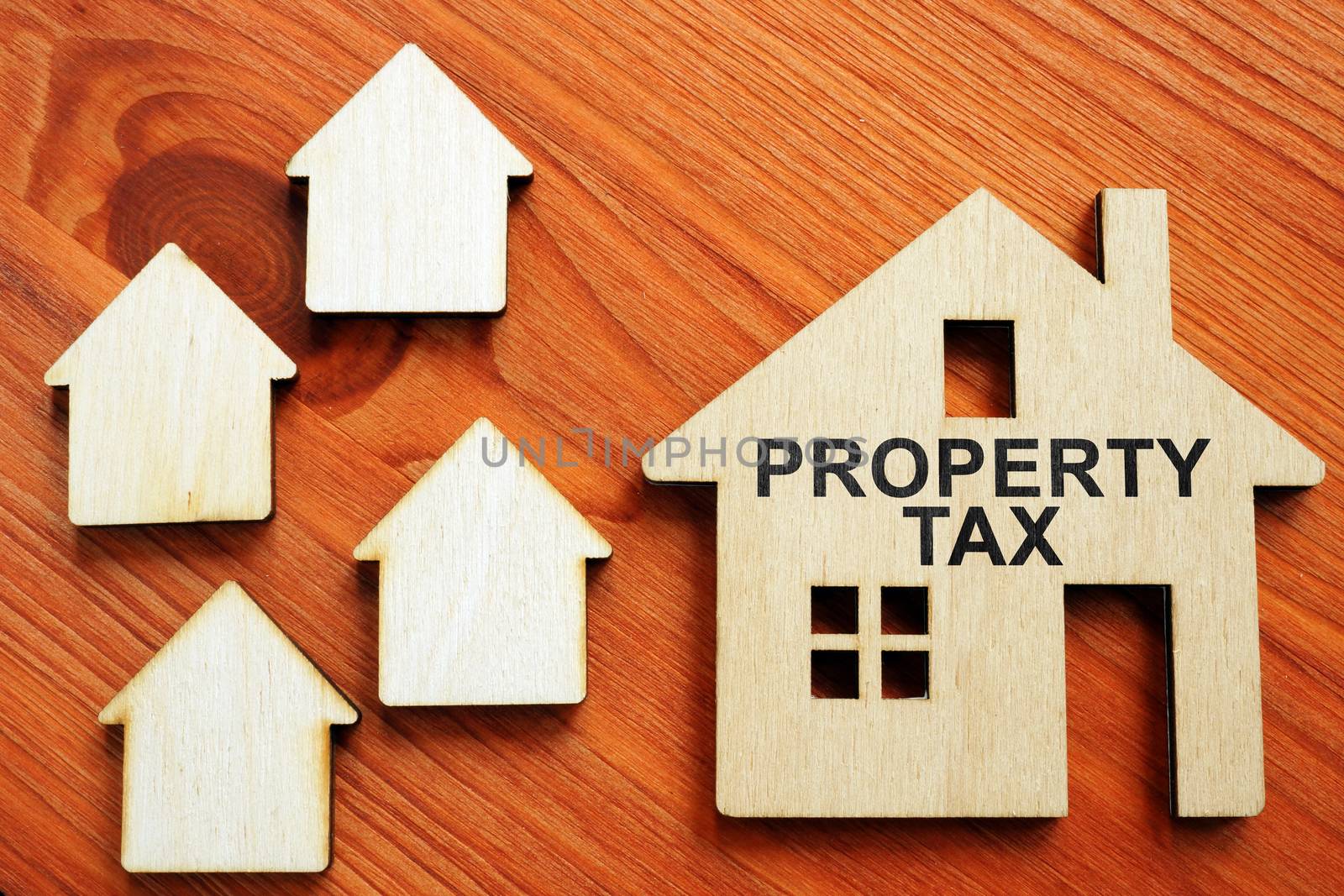 Property Tax sign and small houses.