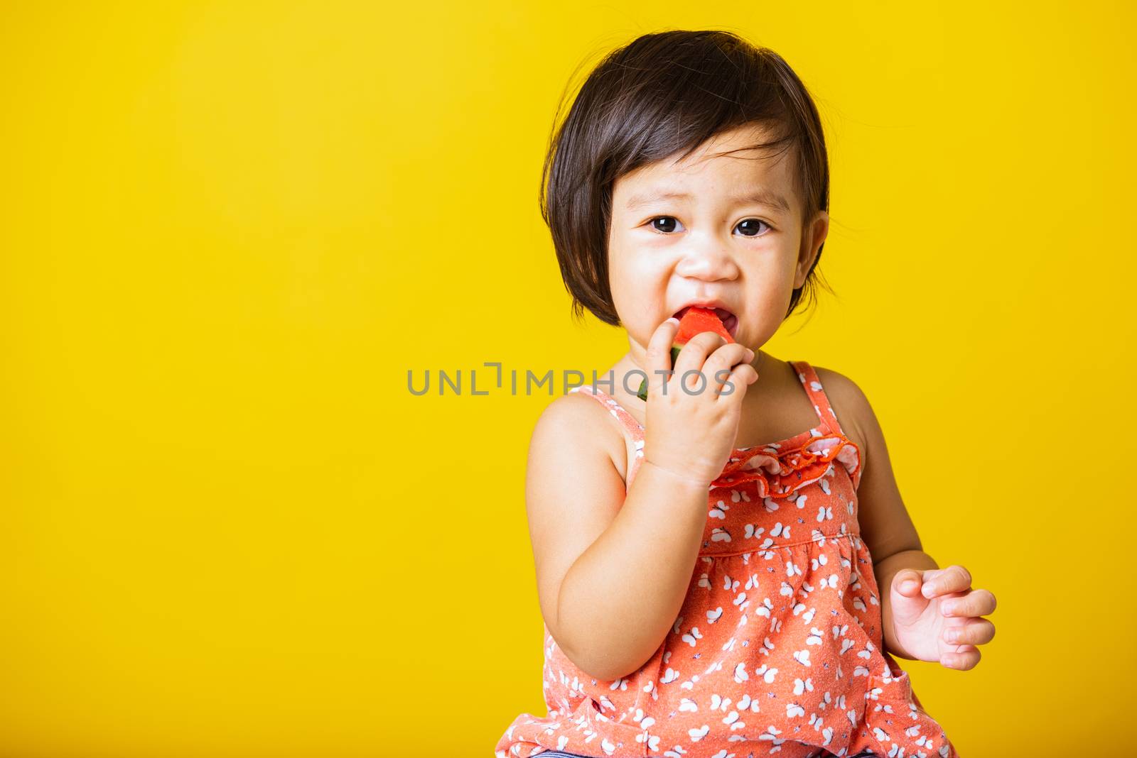baby or kid cute little girl attractive laugh smile wearing t-sh by Sorapop