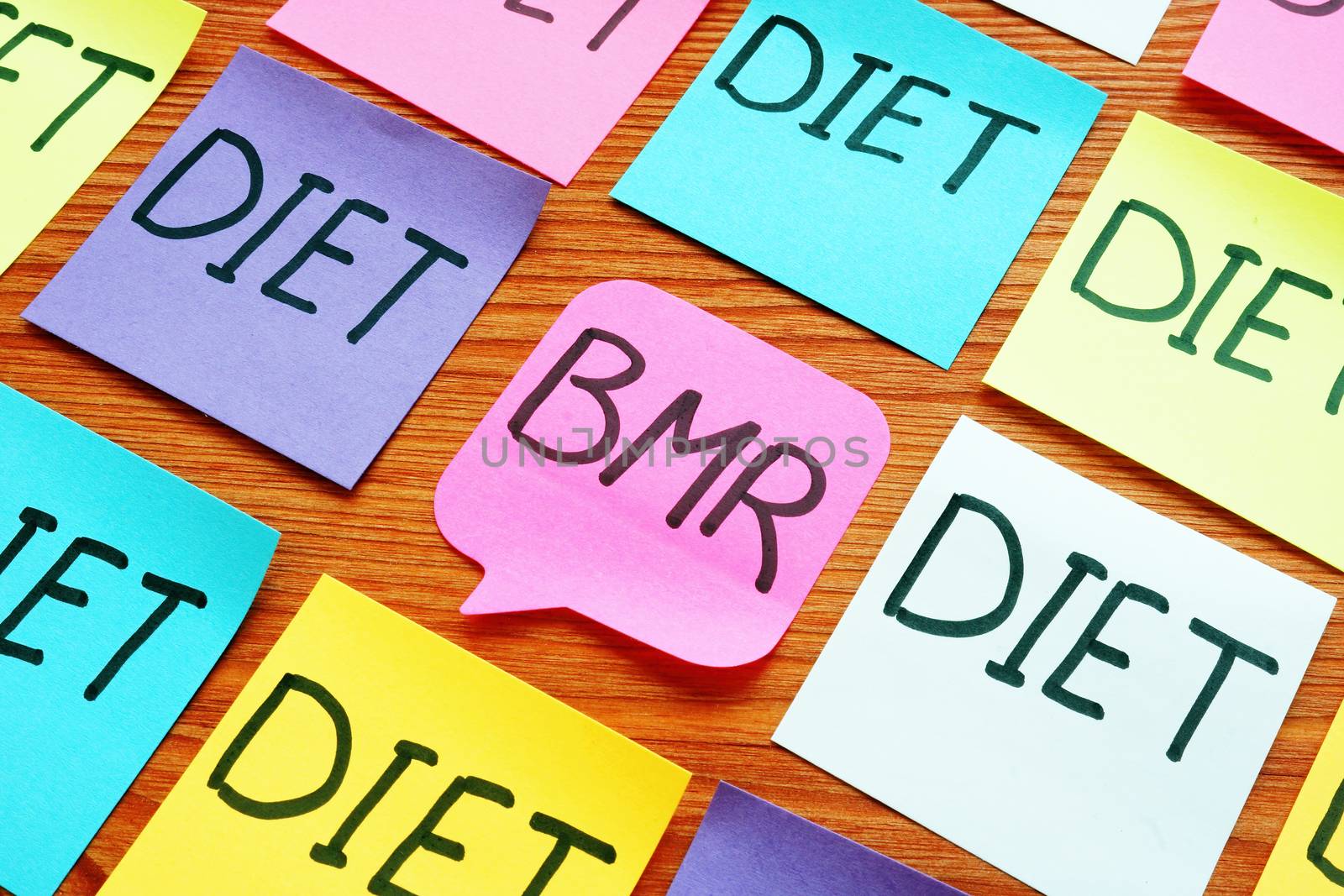 BMR basal metabolic rate and diet signs on the memo sticks. by designer491