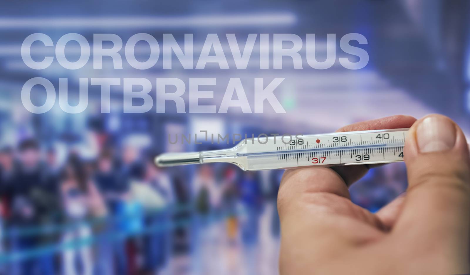 Coronavirus outbreak. Thermometer in a male hand. by rarrarorro