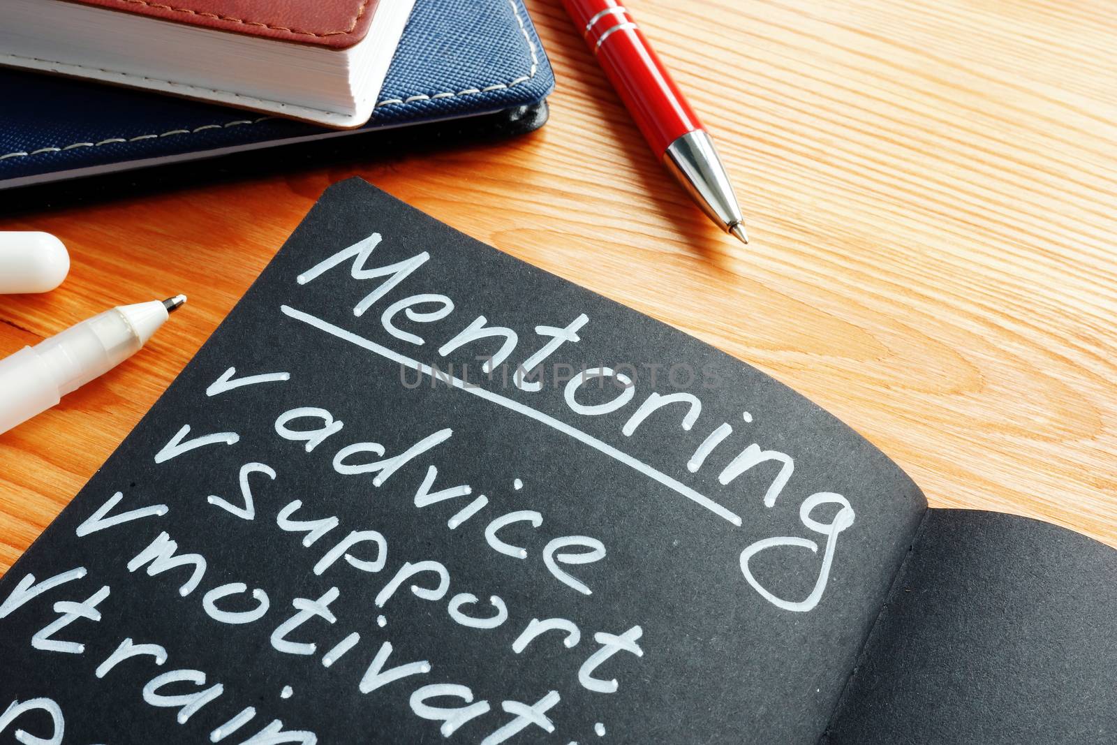 Mentoring with mentor list advice, support and motivation in the notepad.