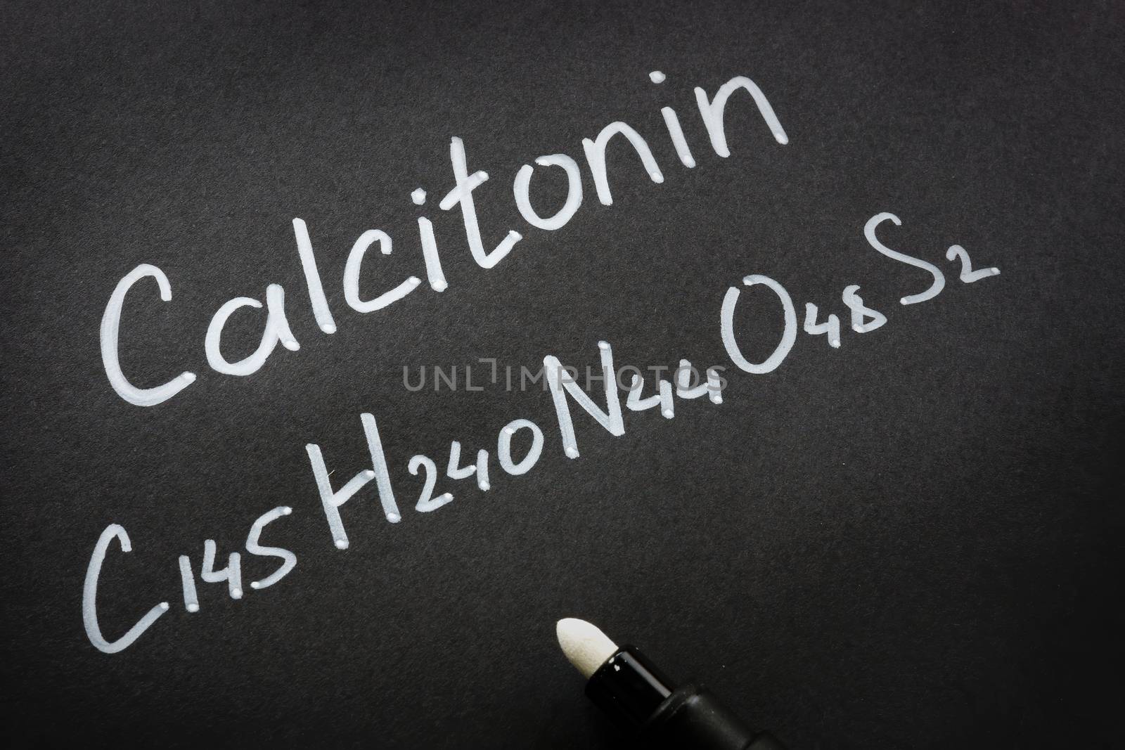 Calcitonin hormone and handwritten molecular formula.