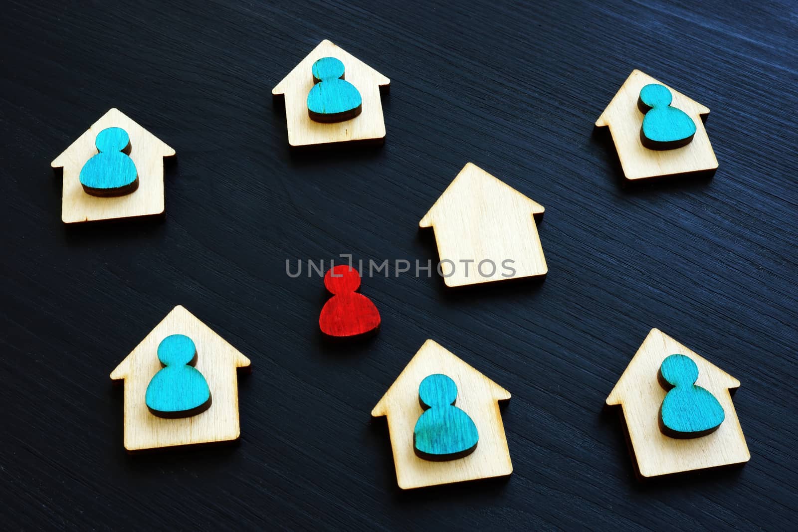 Stay at home concept. Quarantine and self-isolation. Homes and red figurine.