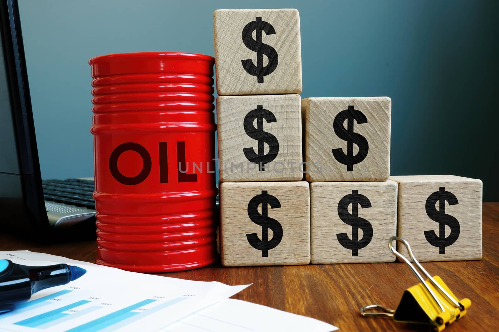 Falling oil price. Barrel and dollar signs.