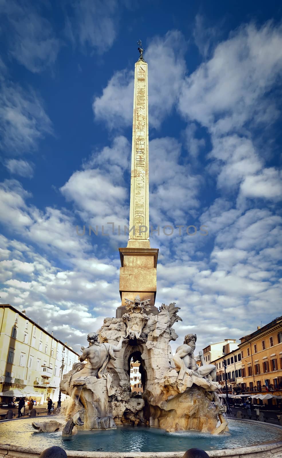 the fountain of the four rivers designed by Bernini in the center of Piazza Navona in Rome by rarrarorro